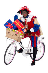 Image showing Zwarte Piet on a bike with presents