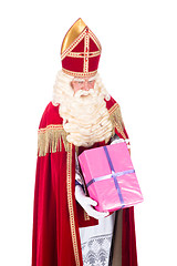 Image showing Sinterklaas is giving a present