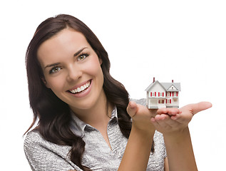 Image showing Smiling Mixed Race Woman Holding Small House Isolated on White