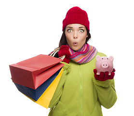 Image showing Concerned Expressive Mixed Race Woman Holding Shopping Bags and 