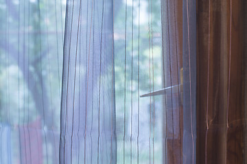 Image showing Transparent curtain on window