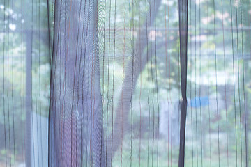 Image showing Transparent curtain on window