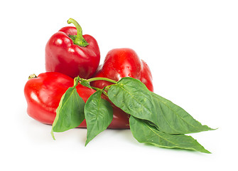 Image showing Red peppers and leaves