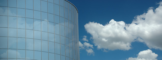 Image showing Corporate building and clouds
