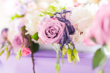 Image showing Tables decorated with flowers. Closeup details