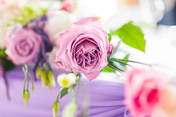 Image showing Tables decorated with flowers. Closeup details