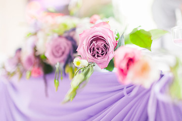 Image showing Tables decorated with flowers. Closeup details