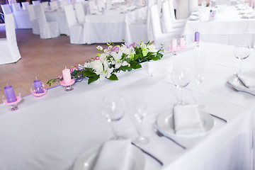 Image showing Tables decorated with flowers