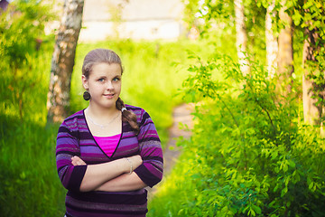 Image showing A Beautiful Young Girl Standing On A Forest Path Road