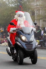 Image showing Santa Claus on   scooter