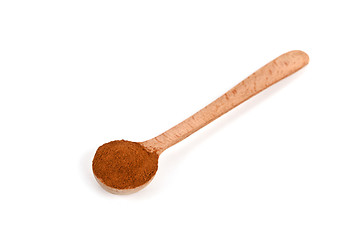 Image showing ground cinnamon in wooden spoon