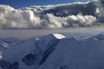 Image showing Winter mountains in evening and cloudy sky