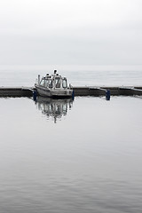 Image showing Solitary boat in a harbor