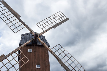 Image showing Old windmill under the cloudy sky