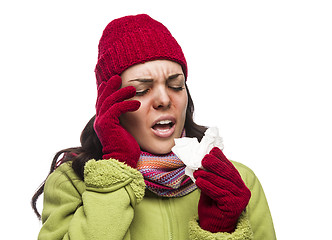 Image showing Sick Mixed Race Woman Blowing Her Sore Nose with Tissue
