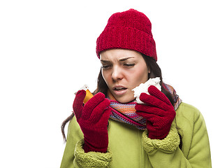 Image showing Sick Mixed Race Woman with Empty Medicine Bottles Blowing Nose 
