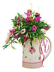 Image showing Colorful flower bouquet from roses and fruits in vase isolated o