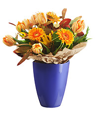 Image showing Colorful bouquet from tulips and gerbera flowers isolated on whi