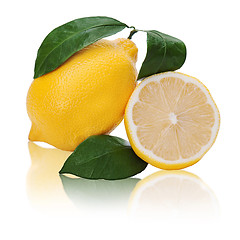 Image showing fresh lemon citrus with cut and green leaves isolated on white b