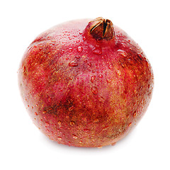 Image showing Ripe pomegranate fruit isolated on white background. Closeup.