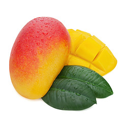 Image showing Fresh mango fruit with cut and green leaves isolated on white ba