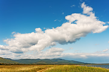 Image showing Landscape with mountain views, blue sky and beautiful clouds.