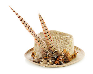 Image showing Hunting hat with pheasant feathers isolated on white background.