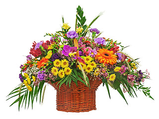 Image showing Colorful flower bouquet arrangement centerpiece in wicker basket