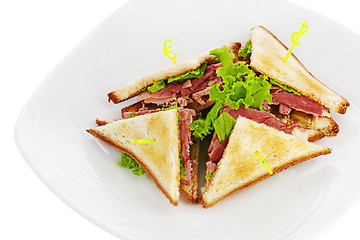 Image showing Sandwiches with  chicken, bacon and vegetables isolated on white