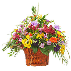 Image showing Flower bouquet arrangement centerpiece in wicker basket isolated