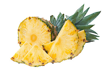 Image showing ripe pineapple with slices  isolated on white background