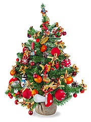 Image showing Christmas fir tree decorated with toys and decorations isolated 