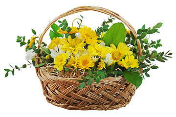 Image showing Colorful bouquet from gerberas in wicker basket isolated on whit