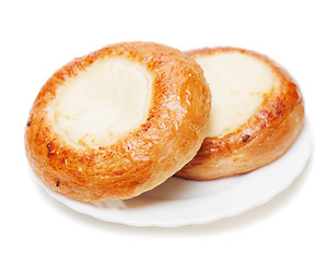 Image showing Fresh buns muffins with cottage cheese on white background.