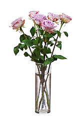 Image showing Colorful flower bouquet from roses in glass vase isolated on whi