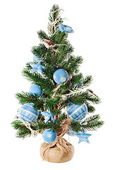 Image showing Christmas fir tree decorated with toys and Christmas decorations