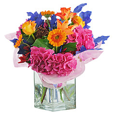 Image showing Colorful flower bouquet in vase isolated on white background.