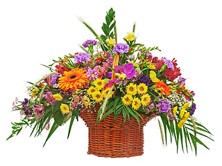 Image showing Flower bouquet arrangement centerpiece in wicker basket isolated