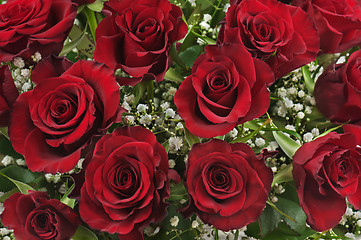 Image showing Colorful flower bouquet from red roses. 