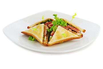 Image showing Sandwiches with  chicken, bacon and vegetables isolated on white