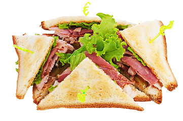 Image showing Sandwiches with  chicken, bacon and vegetables isolated on white