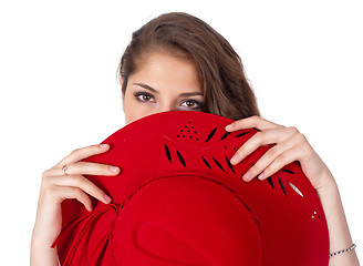 Image showing young beautiful woman with red hat