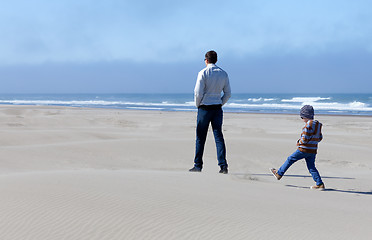 Image showing family in sand dunes