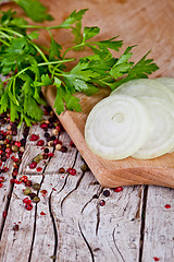 Image showing fresh sliced onion, peppercorns and parsley 