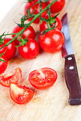 Image showing fresh tomatoes and old knife