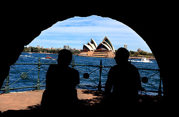 Image showing Silhouette of man and woman enjoying Sydney Harbour and Opera Ho