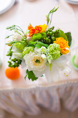 Image showing tables decorated with flowers and fruit