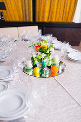 Image showing tables decorated with flowers