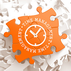 Image showing Time Management Concept on Orange Puzzle Pieces.