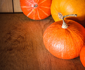 Image showing Pumpkins on grunge wooden backdrop background